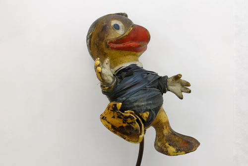 The Disney figure that bangs onto the piano keyboard is made of PVC, which owing to the migration of the plasticizers had become seriously discoloured. Photo: Tom Bisig, Basel